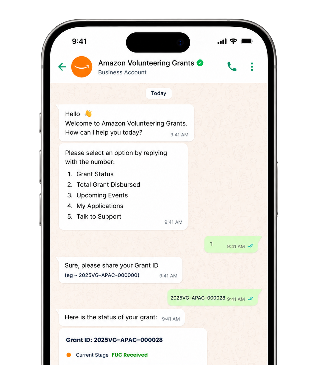 WhatsApp chat showing a grant status lookup for Amazon Volunteering Grants